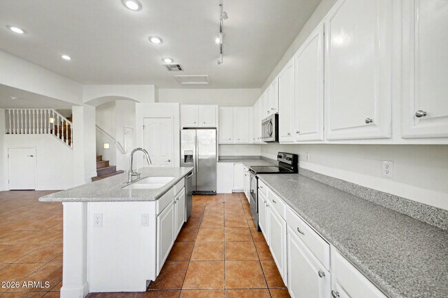 Building Photo - 7456 W Aurora Dr