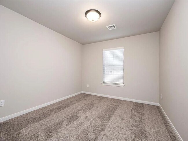 Building Photo - 4-Bed Home with Storm Shelter & 2-Car Garage in Mustang