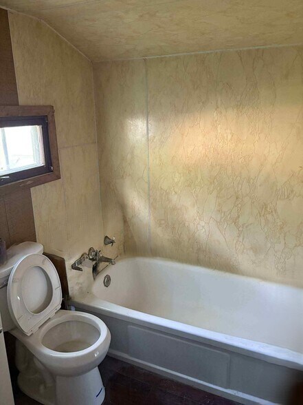 Bathroom New Toilet and Flooring - 259 Elizabeth St