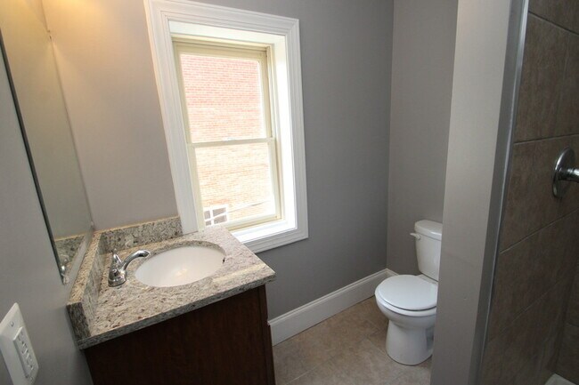 Building Photo - 211 W Lanvale St