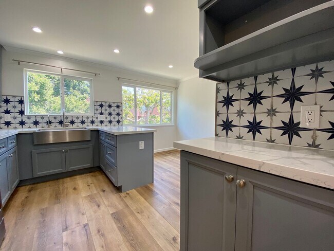 Building Photo - Remodeled 3BR, 2BA with Orchard, Garage & ...