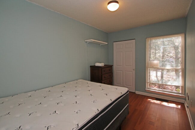 Building Photo - "Rent a room in this 4-Bedroom Furnished T...