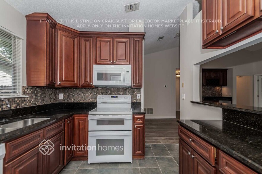 Building Photo - 6151 Jonquil Ct