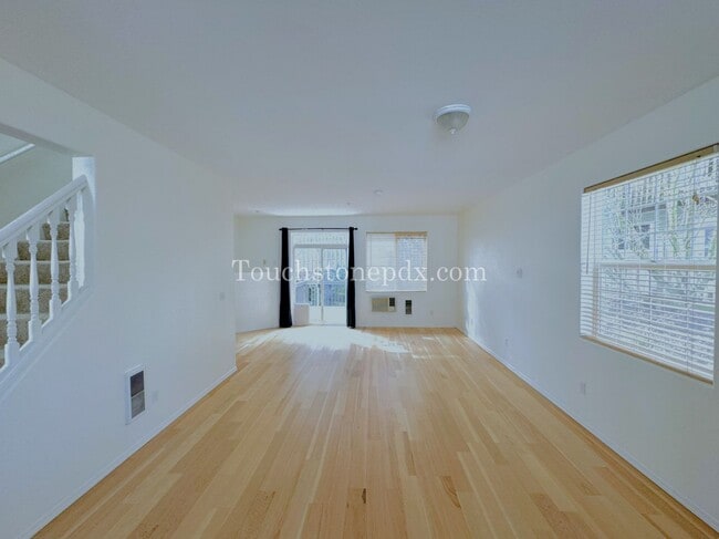 Building Photo - Light Filled 3 Bedroom Townhome with Deck, Attached Garage, and AC