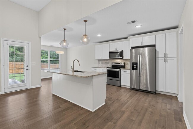 Building Photo - Like New Three Bedroom with Bonus!