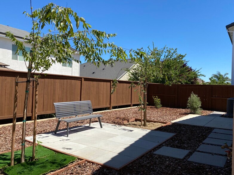 Backyard with Lounge Chair - 1683 Sandoval Dr