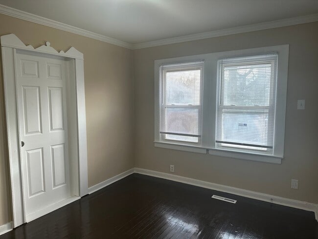 Building Photo - Four-Bedroom Bungalow with Fenced Yard Nea...