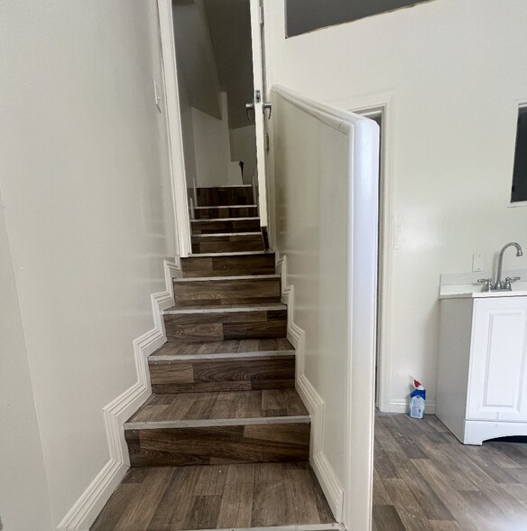 Above the stares there is extra storage space. - 640 Cavanagh Rd