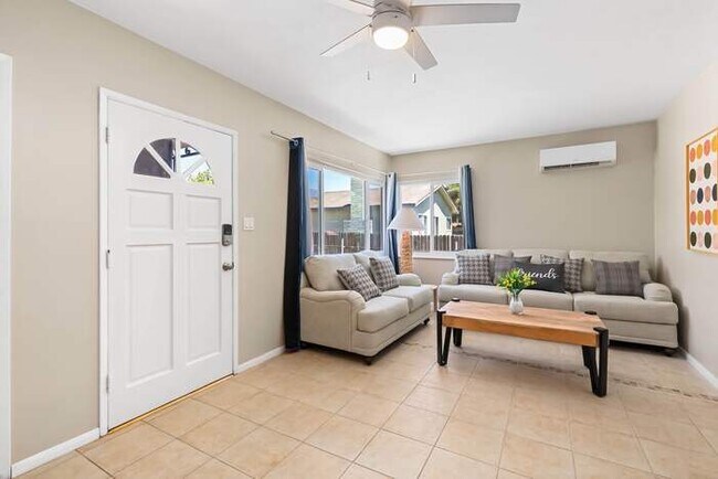 Building Photo - Cozy 2BR Home with Bright Interior & Relaxing Patio