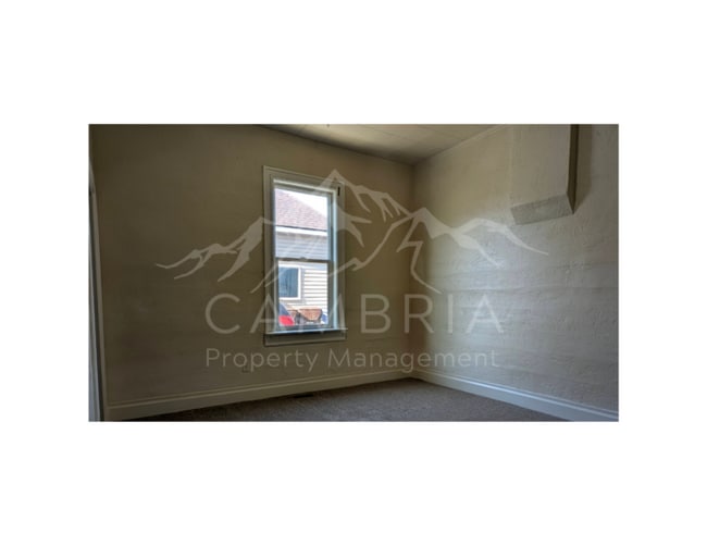 Building Photo - Charming 4-BR Home in Midvale