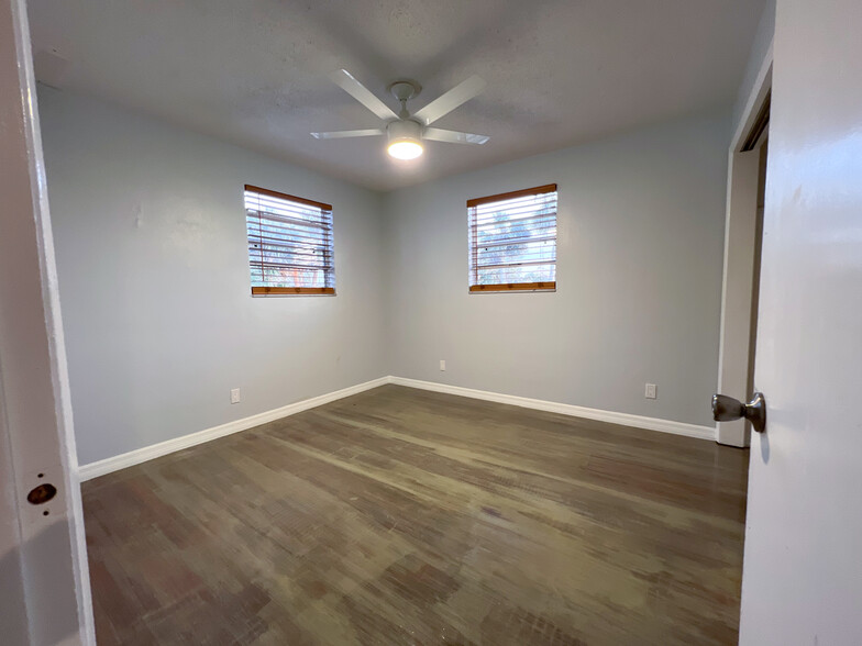 EAST BEDROOM WITH SOLID WOOD FLOORS NEWLY GLAZED - 500 Silver Beach Ave