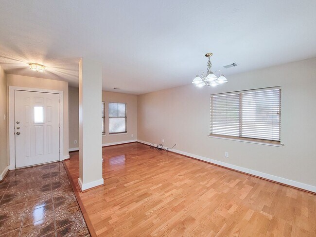 Building Photo - 3 bedroom one story home on large corner lot. Home has hard flooring throughout living areas and ...