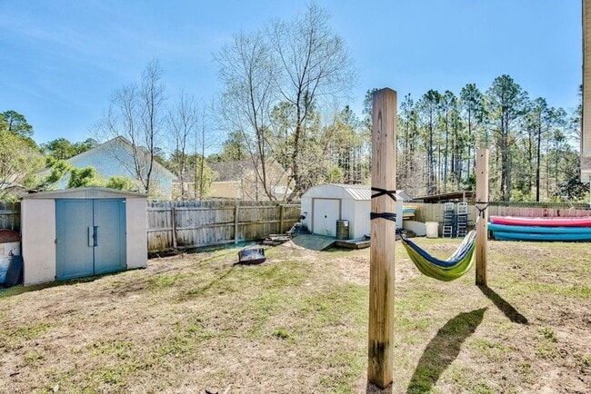 Building Photo - PRICE DROP!! Great 3-bedroom Florida cotta...