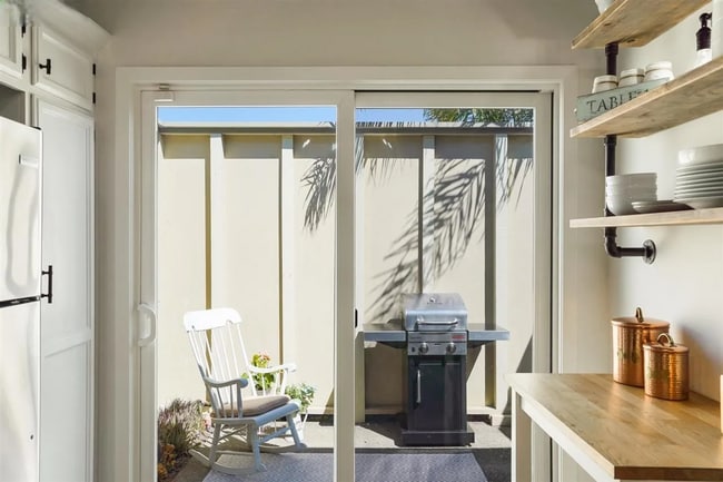 Building Photo - Spacious 1,550 Sq Ft Townhome | 2-Car Garage & High Ceilings w/ Exposed Beams