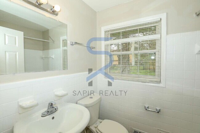 Building Photo - Timeless All-Electric Ranch Charm in a Vibrant, Peaceful Corner of South River Gardens