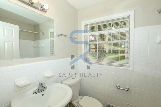 Building Photo - Timeless Ranch Charm in a Vibrant, Peaceful Corner of South River Gardens