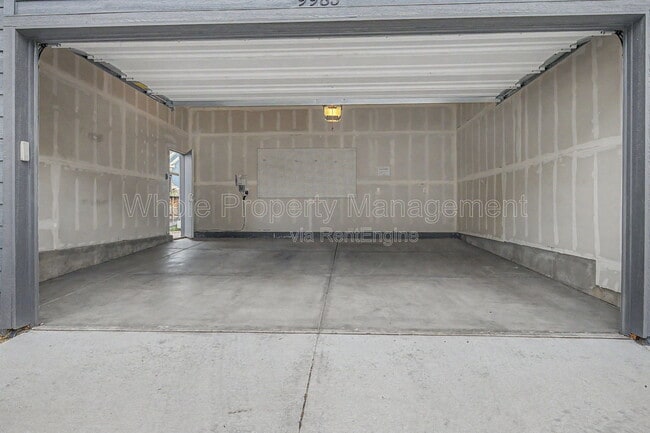Building Photo - 9985 E 59th Ave