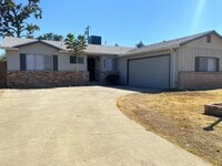 Building Photo - Available NOW! 4/2 With New Exterior Paint!!