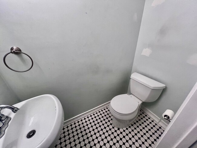 Building Photo - Three-bedroom, two-and-a-half bathrooms in...