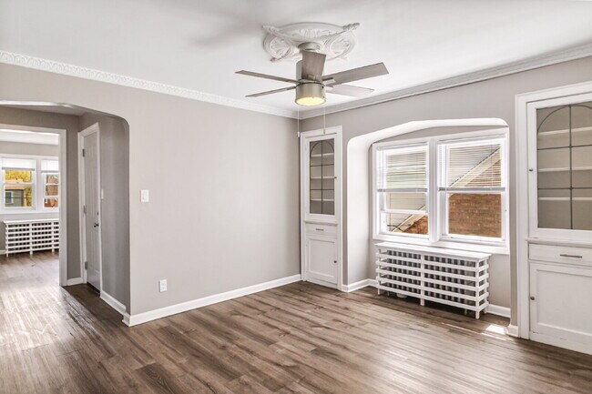 Building Photo - This spacious upper unit features 2 comfortable bedrooms with carpeting