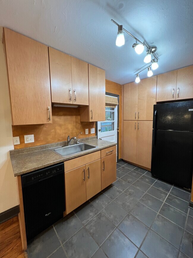 Kitchen is designed for efficiency and high amounts of cabinet space. - 73 Swannanoa Ave