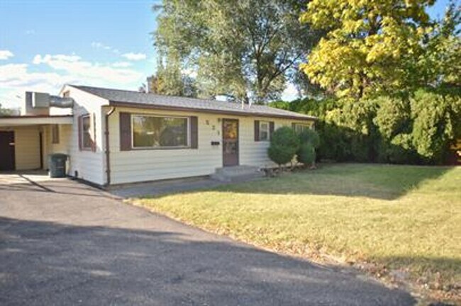 Building Photo - Updated house with original hardwoods and 2-car garage!
