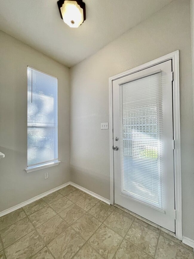 Building Photo - Spacious Home with Multiple Outdoor Living...