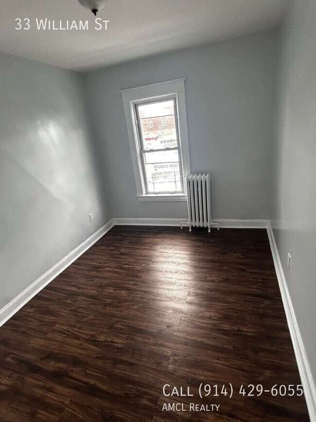 Building Photo - 33 William St