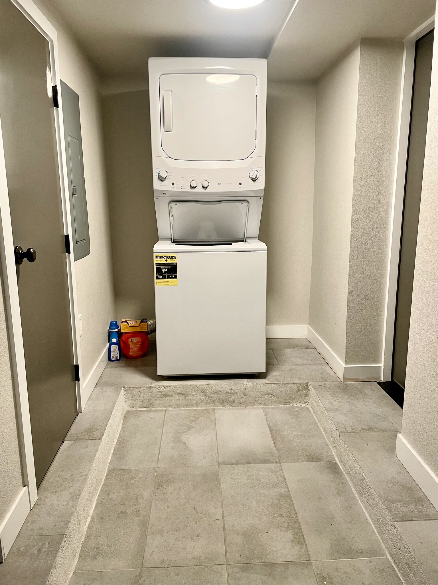 Shared laundry located directly outside of unit in hallway - 5306 NE 15th Ave