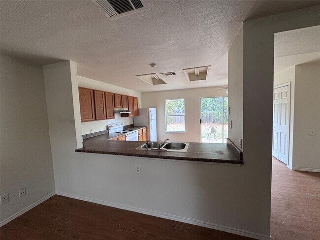 Building Photo - 10935 Old Manchaca Rd
