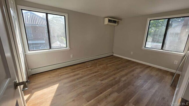Building Photo - 206-66 46th Ave