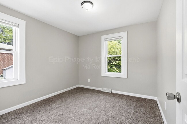 Building Photo - 3117 Coucy Ave