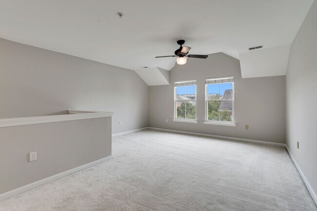 Building Photo - COMING SOON - Great 4 level end unit TH in...