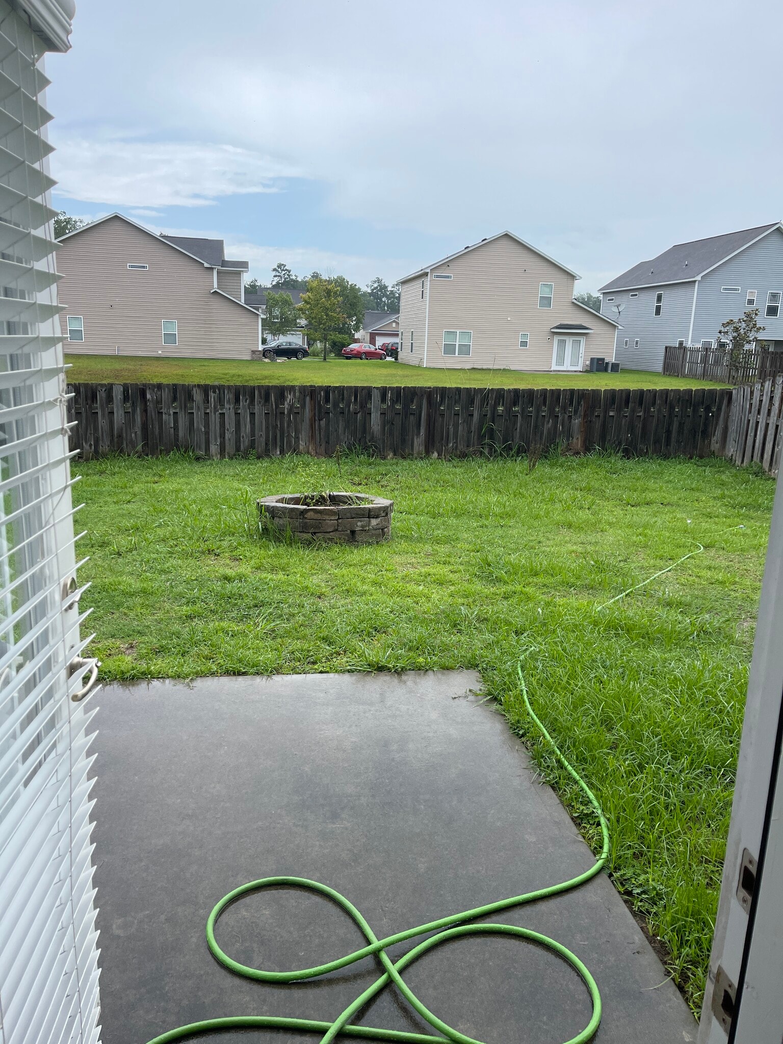 Fenced backyard with Patio and Fire Pit - 194 Chapel Lk S