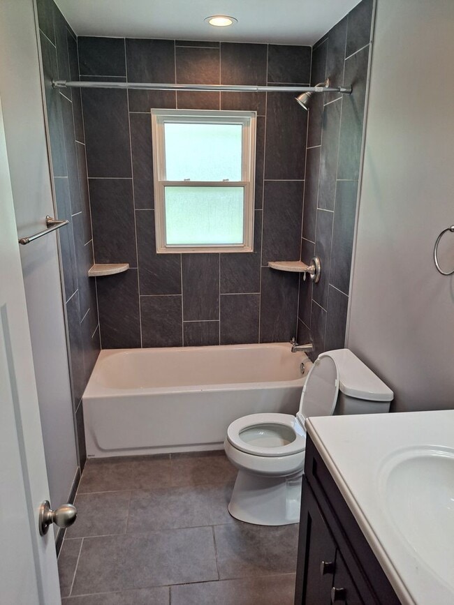 Building Photo - District 66 - 4/2/1 fenced backyard