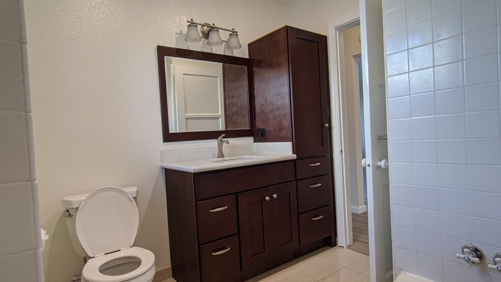bathroom with tub - 2455 W 233rd St