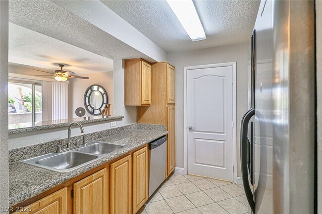 Building Photo - 5055 W Hacienda Ave
