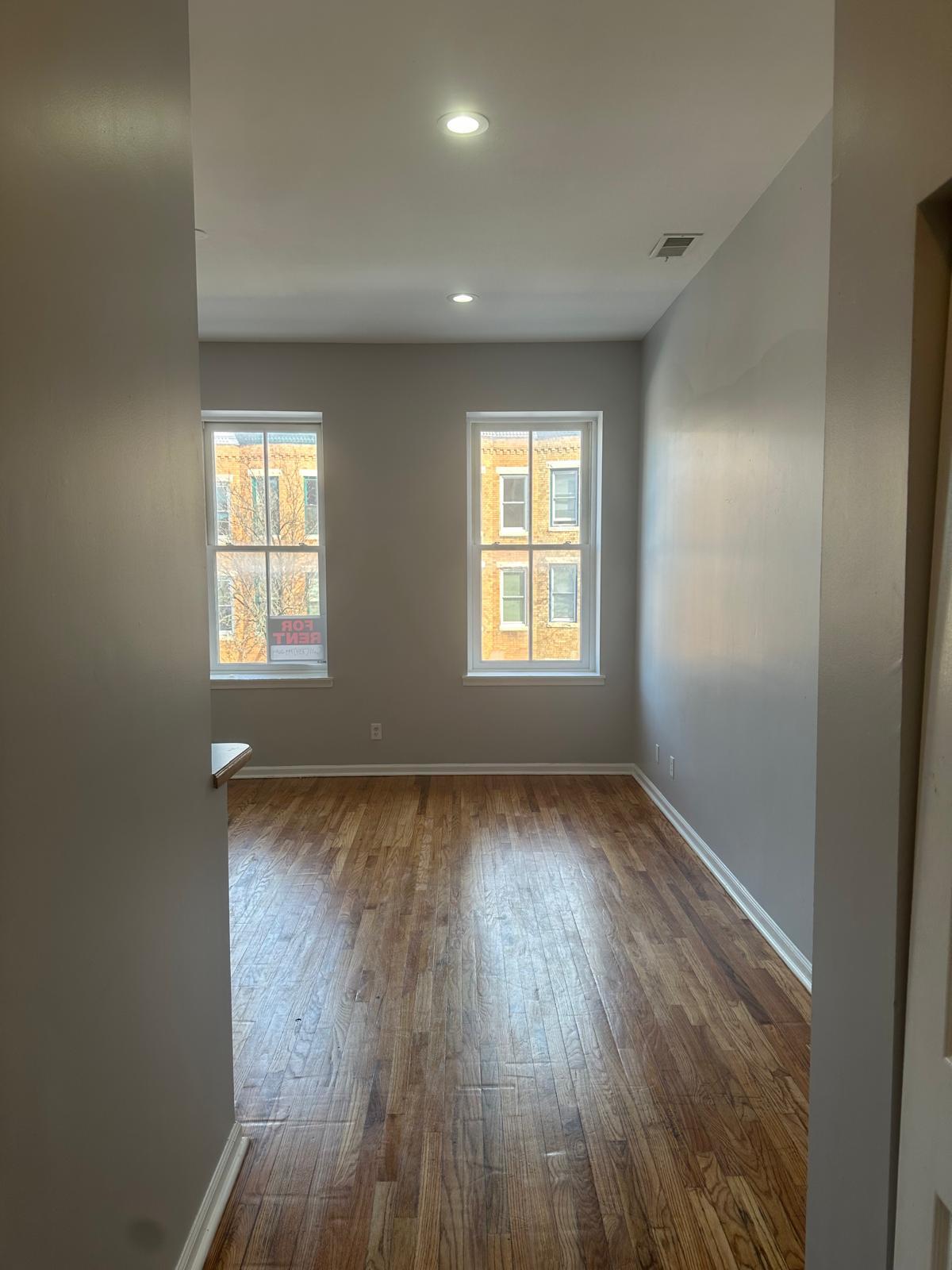 Entry of the unit with large window. Great for natural light - 1426 Madison Ave