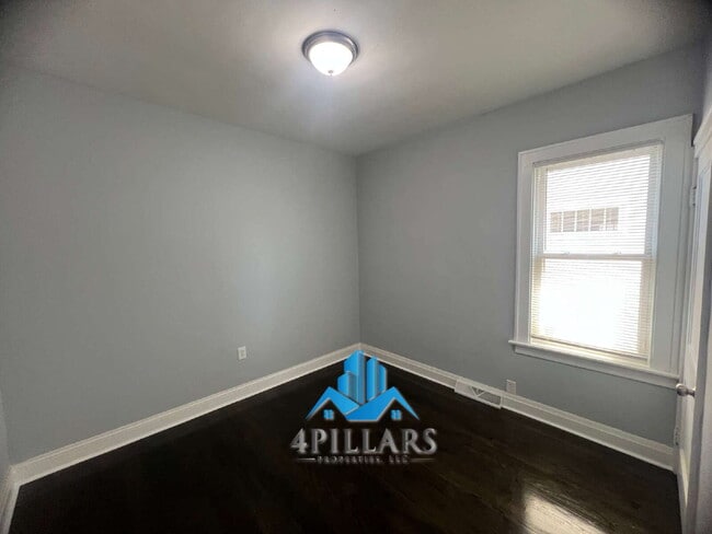 Building Photo - "Charming 3-Bed Home with Partially Finished Basement & Gleaming Hardwood Floors in Hammond - 226...