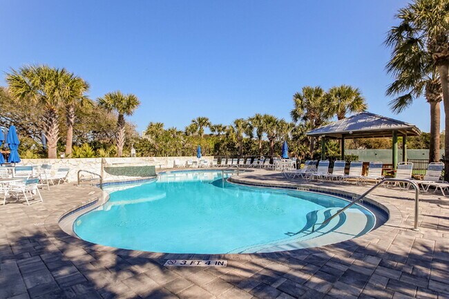 Building Photo - Coastal Living Just 2 Blocks from the Beach | Gated Community + Resort Amenities