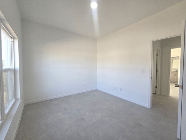 Building Photo - Brand New 2/2/1-PRIME SW LOCATION - Lehigh Acres