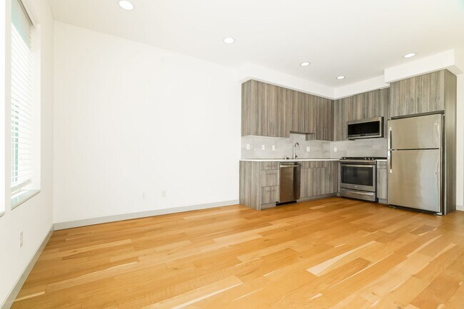 Building Photo - Luxury New Construction with Rooftop Views