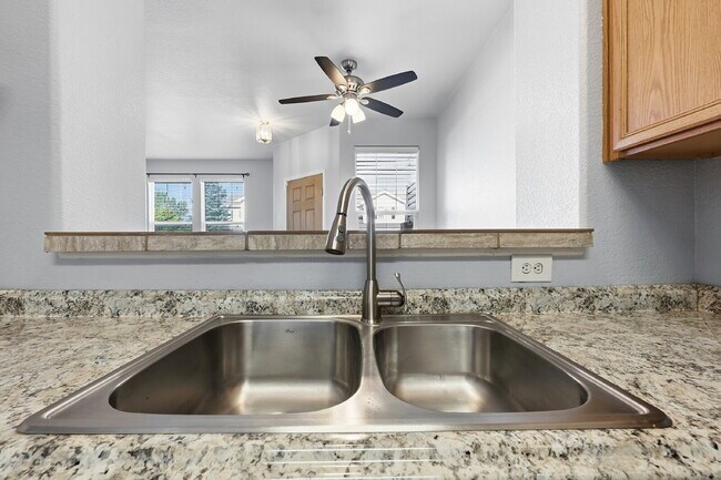 Building Photo - $1,945.95 - 2 Bed, 2.5 Bath Townhome in Colorado Springs with Attached Garage!