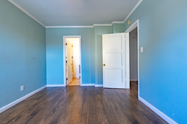 Bedroom 3 - third angle with view of bathroom - 6401 Arlington Ave