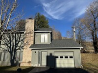 Building Photo - Quiet, Residential Townhome Community righ...