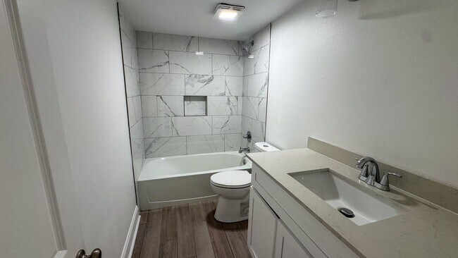 Building Photo - 7423-7429 Hampson - 7423 Basement Left