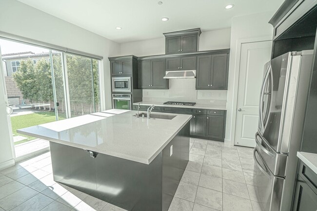 Building Photo - 5-Bedroom Home with Loft in Gated Victoria at Plum Canyon!