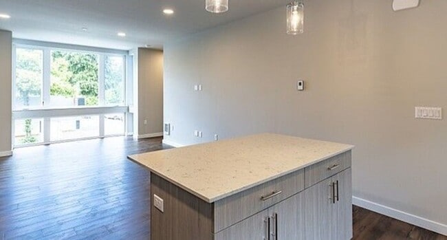 Building Photo - Brand New Pinehurst Home with Hardwood Floors & Easy I-5 Access