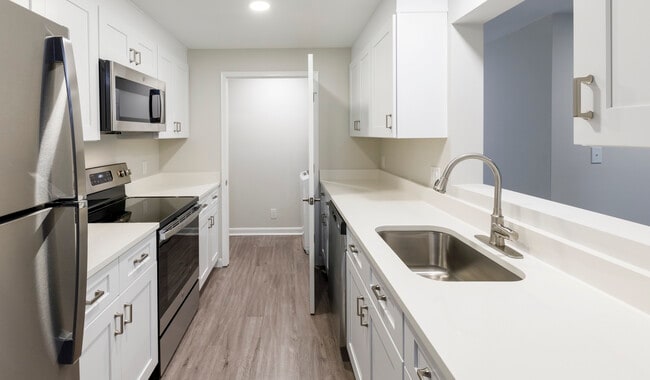 Select units feature upgraded kitchens and in unit laundry - Royal Crest Estates, North Andover