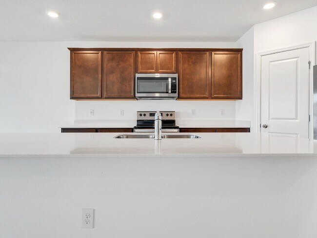 Building Photo - Stunning 4-Bedroom Home with Pond Views in...